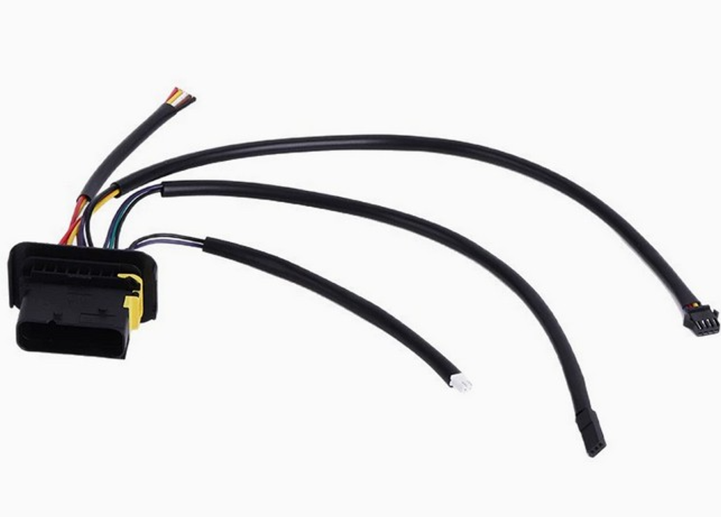 Headlight wiring harness with white braided protective sleeve